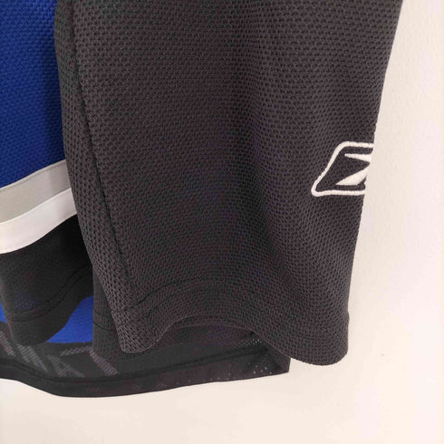 エヌエイチエル NHL フロントチームロゴ L/S ホッケーシャツ BOLTS メンズ import:M