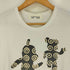 ディエチ コルソ コモ コム デ ギャルソン 10 Corso Como COMME des GARCONS ベアブリック プリントクルーネックTシャツ メンズ JPN:M