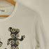 ディエチ コルソ コモ コム デ ギャルソン 10 Corso Como COMME des GARCONS ベアブリック プリントクルーネックTシャツ メンズ JPN:M