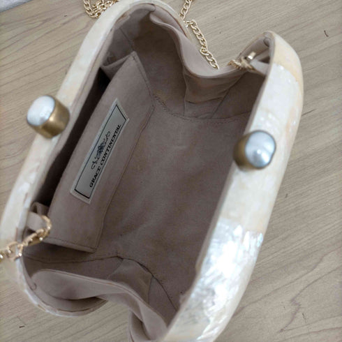 グレースコンチネンタル GRACE CONTINENTAL シェルクラッチバッグ レディース