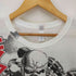 エムアンドオー M&O ©2010 両面プリーツ バンドデザインTシャツ メンズ S