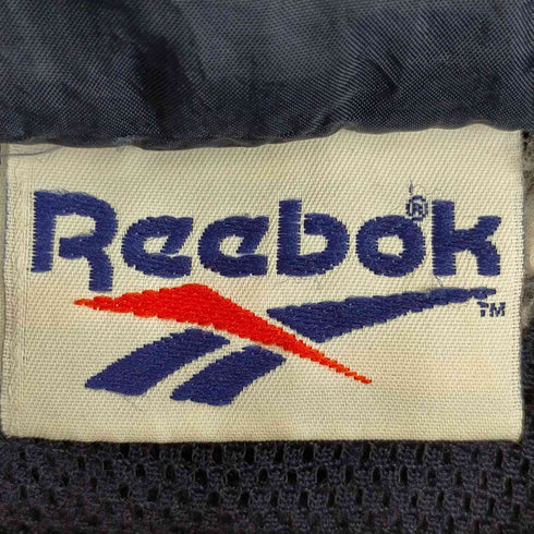 リーボック Reebok 90s 刺繍タグ ロゴ刺繍 パッカブルナイロンジャケット メンズ import:XL