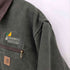 カーハート Carhartt TRUMBULL SAFETY WORKS 企業ロゴ刺繍 裏地ブランケット ダック地 デトロイトジャケット メンズ JPN:XL