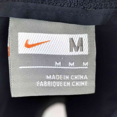 ナイキ NIKE スウッシュ刺繍 パイピングナイロンジャケット レディース JPN:M