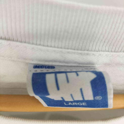 アンディフィーテッド UNDEFEATED LOGO S/S TEE アイコンプリント クルーネック L/S Tシャツ メンズ import:L