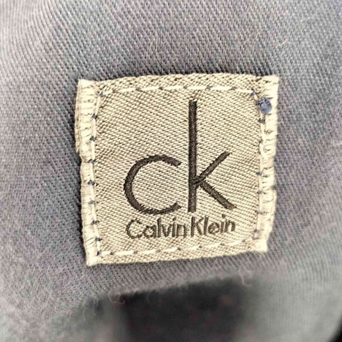 カルバンクライン CALVIN KLEIN センタープレス テーパード コットン パンツ メンズ