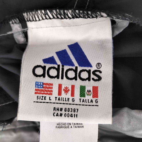 アディダス adidas 万国旗タグ ロゴ刺繍ナイロンハーフジャケット メンズ