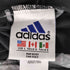 アディダス adidas 万国旗タグ ロゴ刺繍ナイロンハーフジャケット メンズ