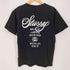 ステューシー Stussy ワールドツアー 両面プリント 半袖Tシャツ メンズ JPN:M