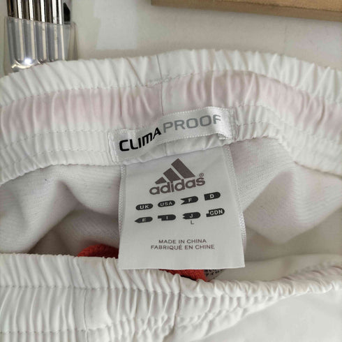 アディダス adidas CLIMAPROOF パフォーマンスロゴ刺繍 サイドライン バイカラーパンツ メンズ JPN:L