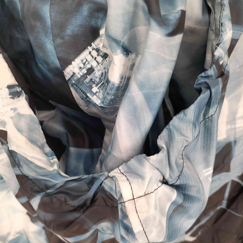 プーマ PUMA PUMA by hussein chalayan Urban Mobility 総柄 マウンテンパーカー メンズ import:S