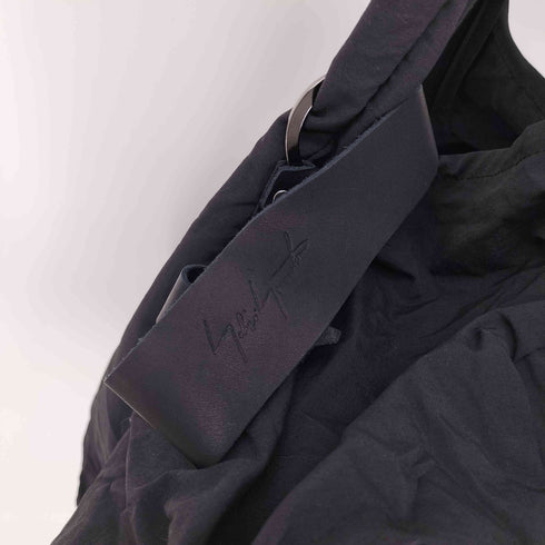 ディスコードヨウジヤマモト discord Yohji Yamamoto カウレザーストラップ 変形ナイロントートバッグ エコバッグ メンズ