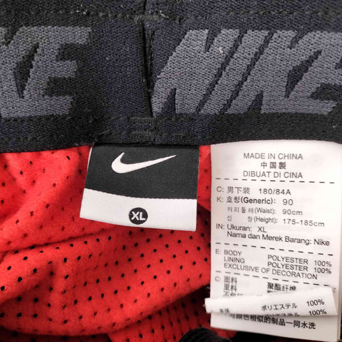 ナイキ NIKE スウォッシュ刺繍トラックパンツ メンズ JPN:XL