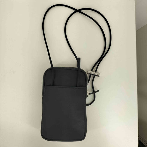 ラコステ LACOSTE L.12.12 CUIR ANIMAネームレタリングレザースマホウォレット メンズ
