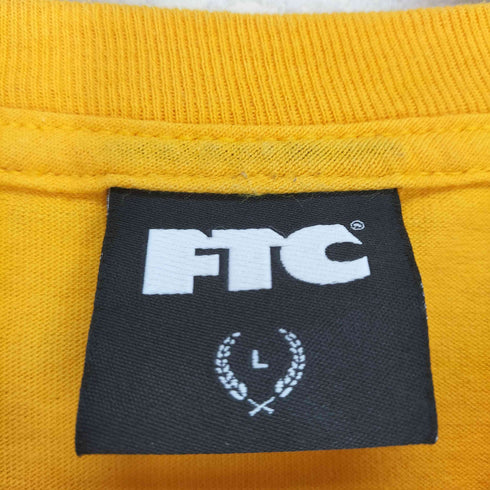 エフティーシー FTC フロントロゴプリントクルーネックTシャツ メンズ JPN:L