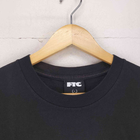 エフティーシー FTC グラフィックTシャツ メンズ JPN:L
