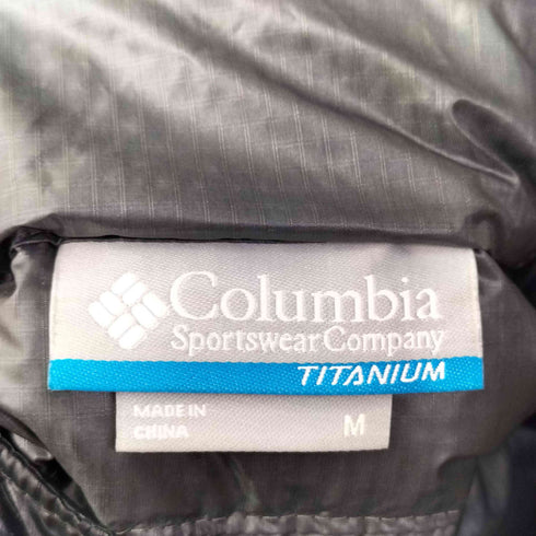 コロンビア Columbia TITANIUM OMNI-SHIELD ロゴ刺繍 裾ドローコード フーデッド ダウン ベスト メンズ import:M