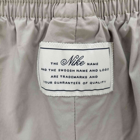 ナイキ NIKE アイコンクラッシュウーブンパンツ レディース JPN:S