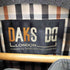 ダックスロンドン DAKS LONDON スタンドカラーナイロンベスト 裏地ノバチェック メンズ JPN:M