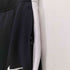 ナイキ NIKE 裾ジップフレアトラックパンツ メンズ JPN:M