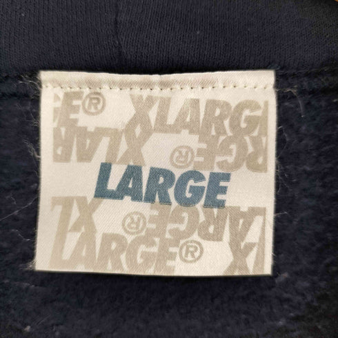 エクストララージ XLARGE 初期 プリントプルオーバーパーカー メンズ