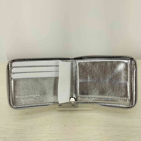 コムデギャルソン COMME des GARCONS EMBOSSED LOGOTYPE ラウンドジップウォレット メンズ