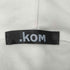 ドットコム .KOM カットオフ加工フロントプリントフーディー レディース