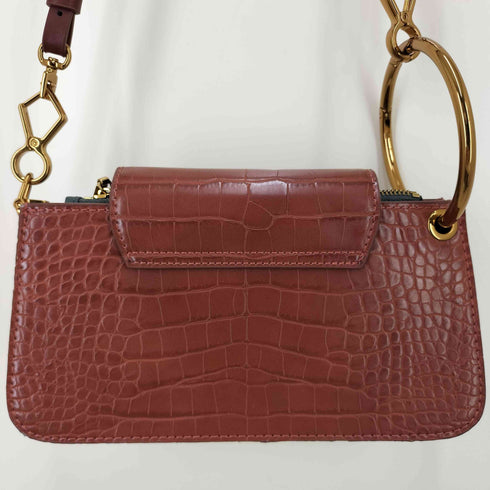 チャールズキース CHARLES & KEITH クロックエフェクトフラップウォレット型押しショルダーバッグ レディース