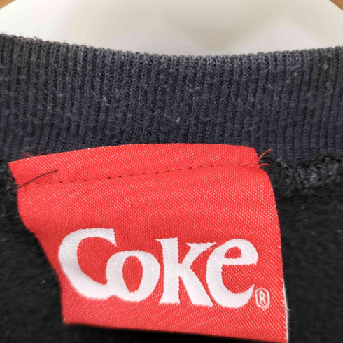 COKE 90S キャラクタープリント L/S スウェット ©The Coca-Cola Company コピーライト入り メンズ