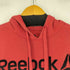 リーボック Reebok ロゴプリントプルオーバーパーカー メンズ JPN:M