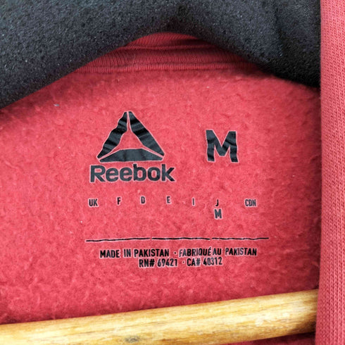 リーボック Reebok ロゴプリントプルオーバーパーカー メンズ JPN:M