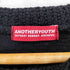 アナザーユーズ ANOTHERYOUTH make noise not money 両面プリント穴あき加工ニット メンズ