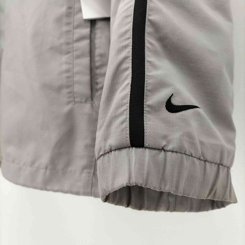 ナイキ NIKE 00S スウッシュ刺繍 リップストップ 裾ドローコード トラック ジャケット メンズ import:L