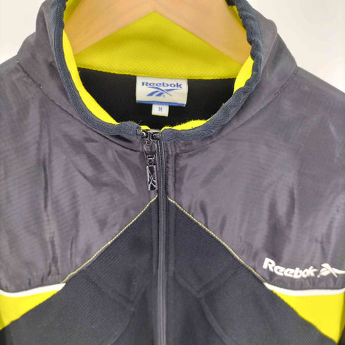 リーボック Reebok バック ベクターロゴ プリント バイカラー 異素材切替 リップストップ トラックジャケット ジャージ メンズ import:M