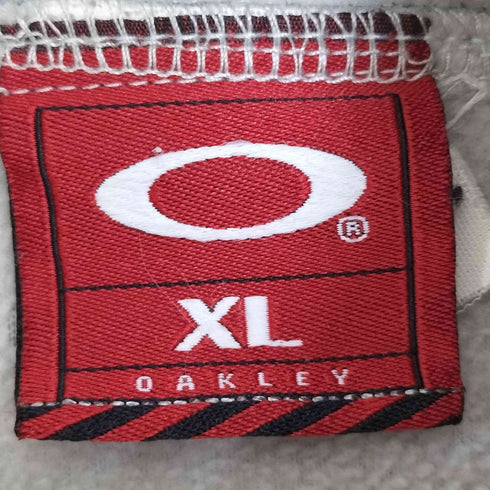 オークリー OAKLEY OLD フリースパーカー 裾ドローコード メンズ import:XL