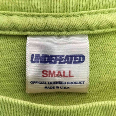 アンディフィーテッド UNDEFEATED USA製 両面プリントロゴ クルーネック 半袖Tシャツ メンズ S