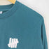 アンディフィーテッド UNDEFEATED USA製 両面プリントロゴ ロングスリーブカットソー メンズ XS