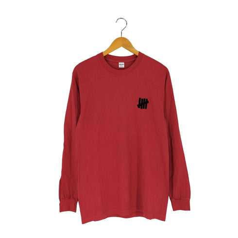 アンディフィーテッド UNDEFEATED USA製 両面プリントロゴ ロングスリーブカットソー メンズ JPN:S