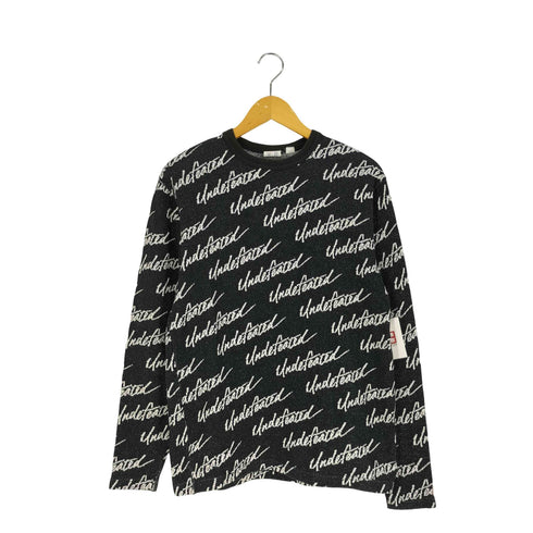 アンディフィーテッド UNDEFEATED 総柄ロゴトレーナー メンズ