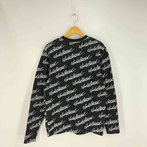 アンディフィーテッド UNDEFEATED 総柄ロゴトレーナー メンズ
