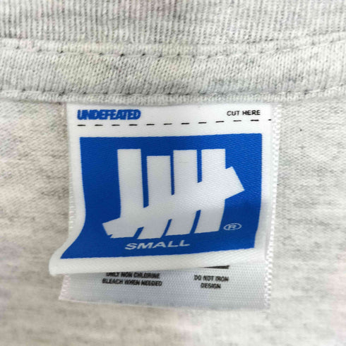 アンディフィーテッド UNDEFEATED USA製 両面プリントロゴ クルーネック ロングスリーブカットソー メンズ S