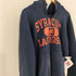 チャンピオン Champion 刺繍タグ REVERSE WEAVE SYRACUSE LACROSSE カプセル 三段 プルオーバーパーカー メンズ import:M
