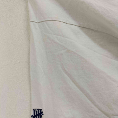 アンディフィーテッドチャンピオン UNDEFEATED CHAMPION 袖ロゴ刺繍クルーネックTシャツ メンズ JPN:XL