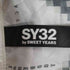 エスワイサーティトゥー SY32 by SWEET YEARS ロゴパッチ 総柄 ジップアップパーカー メンズ import:L