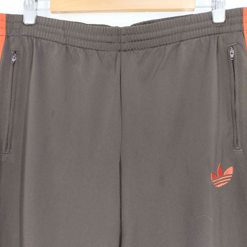 アディダス adidas 3ストライプ ロゴプリント サイドジップ トラックパンツ メンズ import:M