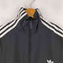 アディダス adidas Adilenium シーズン 2 オーバーサイズ ジップオフトラックトップ メンズ JPN:M