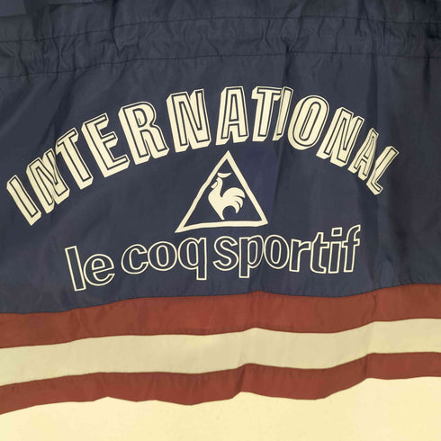 ルコック スポルティフ le coq sportif 万国旗タグ 裏地メッシュパッカブルナイロンジャケット メンズ JPN:M