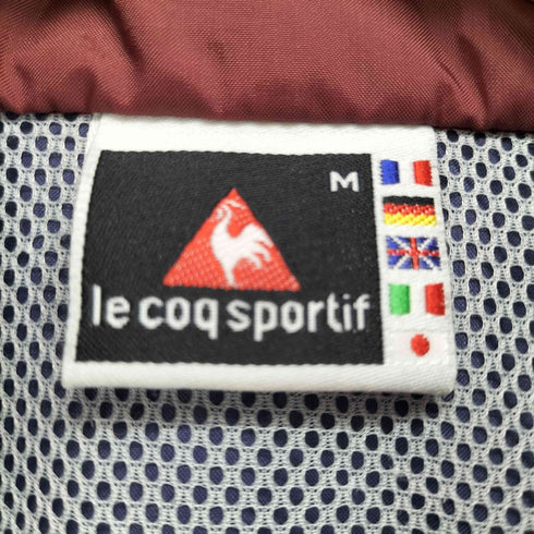 ルコック スポルティフ le coq sportif 万国旗タグ 裏地メッシュパッカブルナイロンジャケット メンズ JPN:M