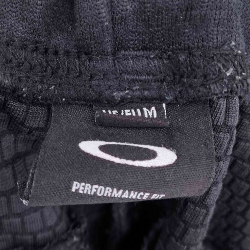 オークリー OAKLEY ロゴプリント ナイロンパンツ メンズ JPN:L