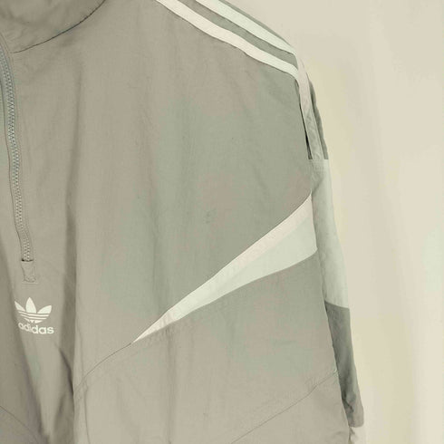 アディダスオリジナルス adidas Originals Oztradamus センターロゴ ハーフジップ ロゴ プリント サイドライン ウインド ブレーカー ジャージ レディース JPN:L